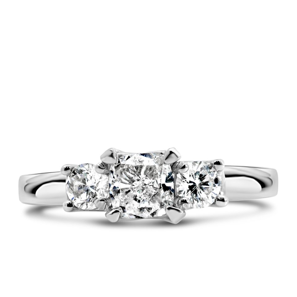 Fire of the North Three Stone Engagement Ring, adorned with a total of 1.02 Carats of sparkling Diamonds, all set in 18kt White Gold